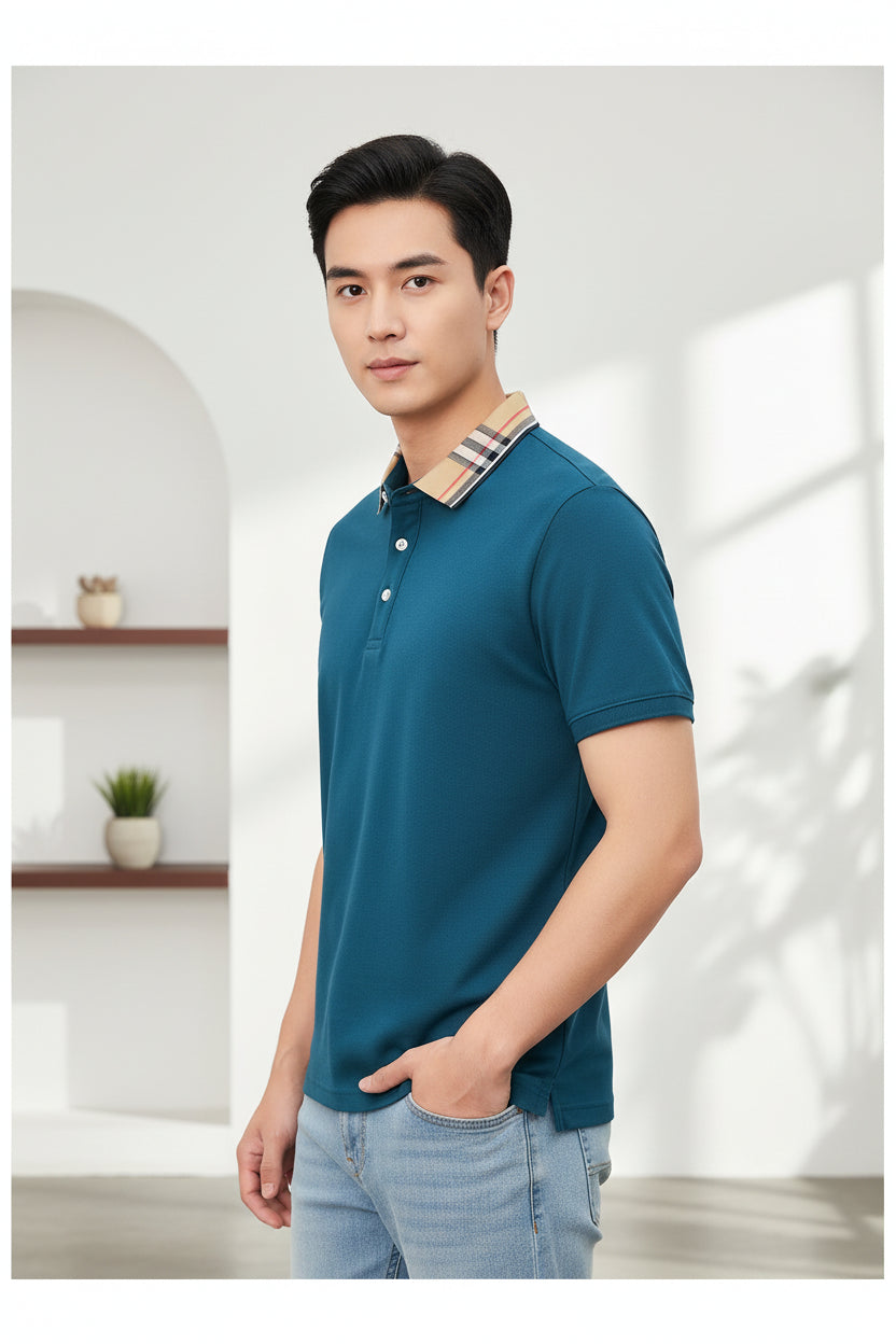 Blue polo shirt with Burberry checkered collar on a hanger
