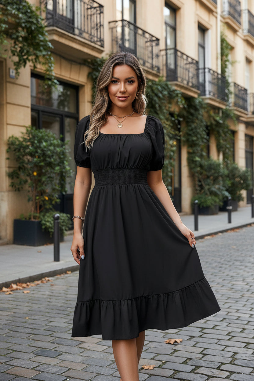 Green dress with puff sleeves worn by a person in a room with a plant and bed.
