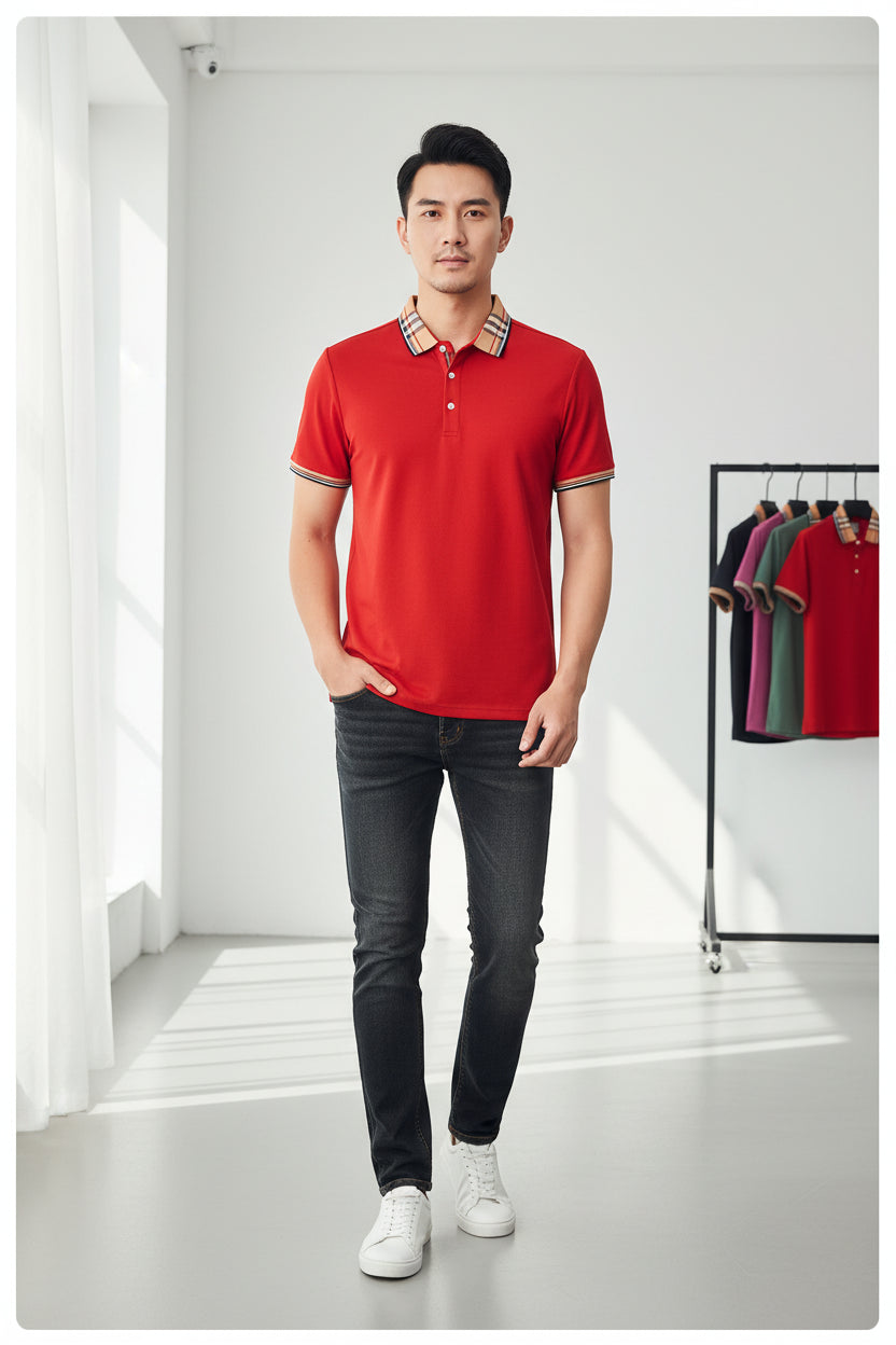 Red polo shirt with plaid collar on a rack of clothes