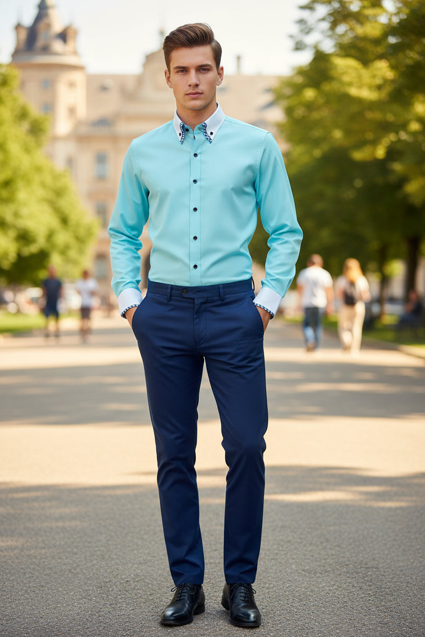 Light blue dress shirt with white collar and cuffs on a gray background