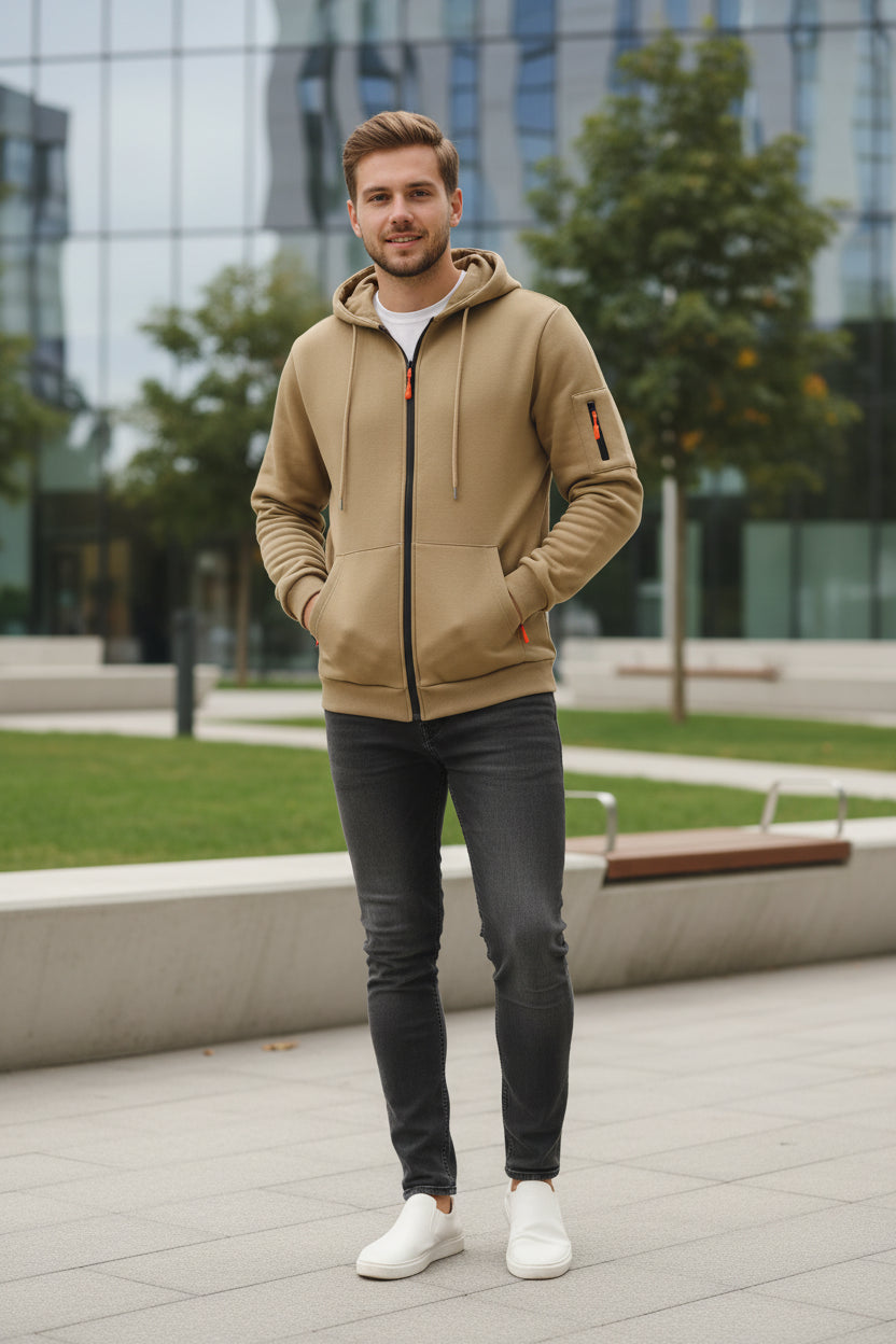 Beige hoodie with black zipper and orange accents on a white background