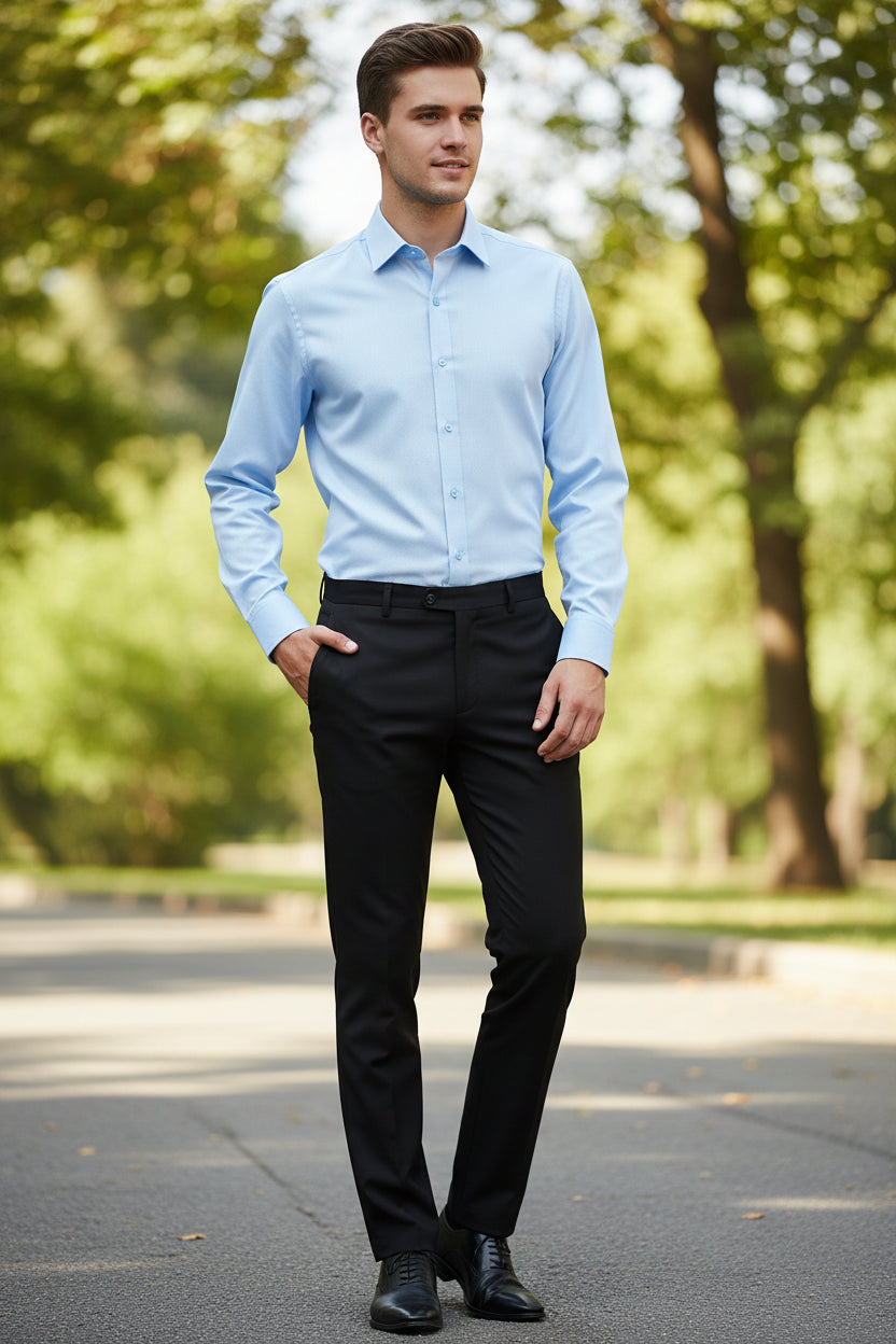 Folded light blue dress shirt on a white background with brand logo.