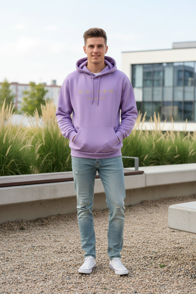 Purple hoodie with 'GOLDEN' text on a textured surface