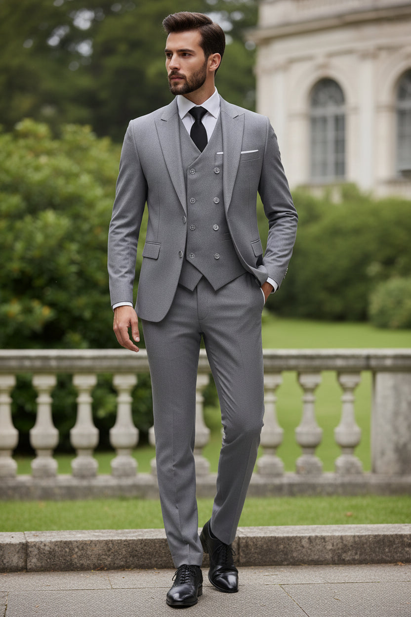 Gray suit with a white shirt and black tie on a white background