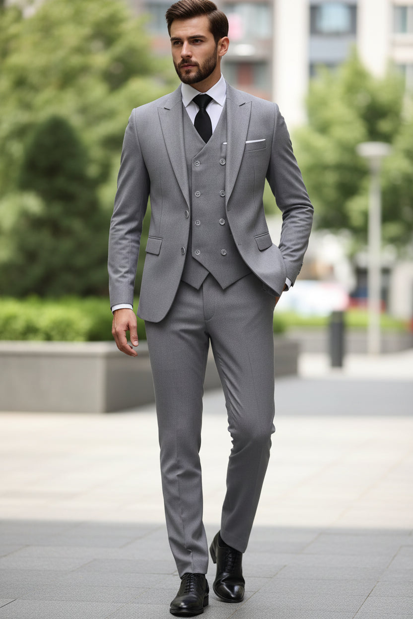 Gray suit with a white shirt and black tie on a white background