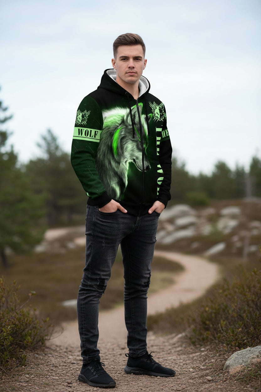 Black hoodie with green wolf design and 'The Wolf' text on a white background