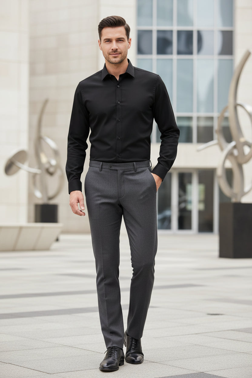 Black dress shirt with a pocket on a white background