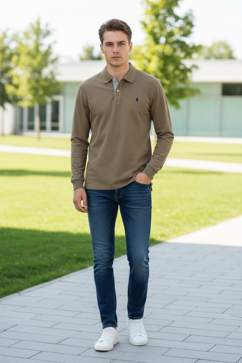 Brown polo shirt with a brand logo held by a hand, with a blurred background of more shirts on hangers.