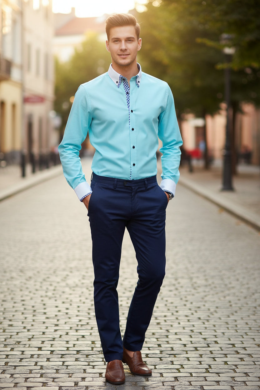 Light blue dress shirt with white collar and cuffs on a gray background