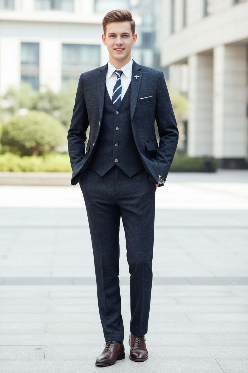 Man wearing a formal suit in an indoor setting