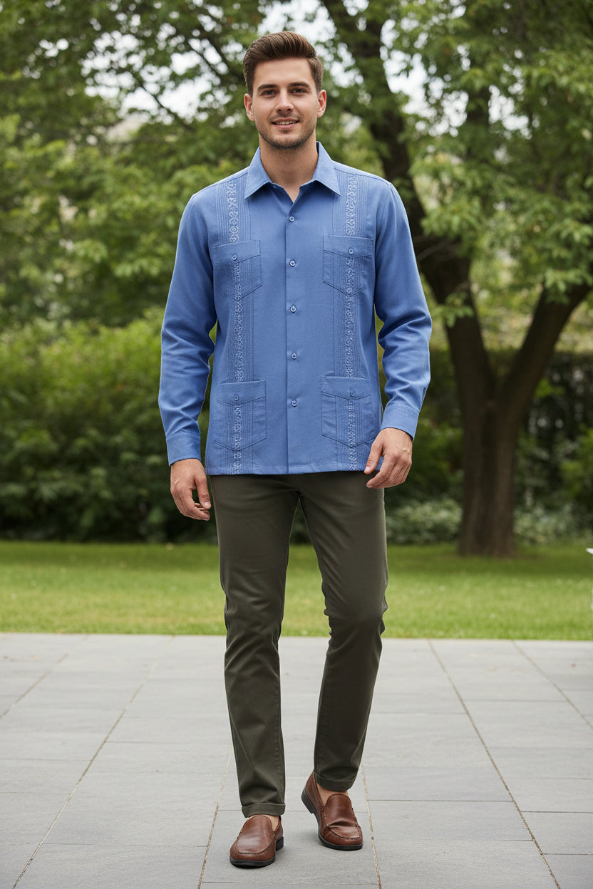 Blue shirt with decorative patterns on a Young man wearing it outside