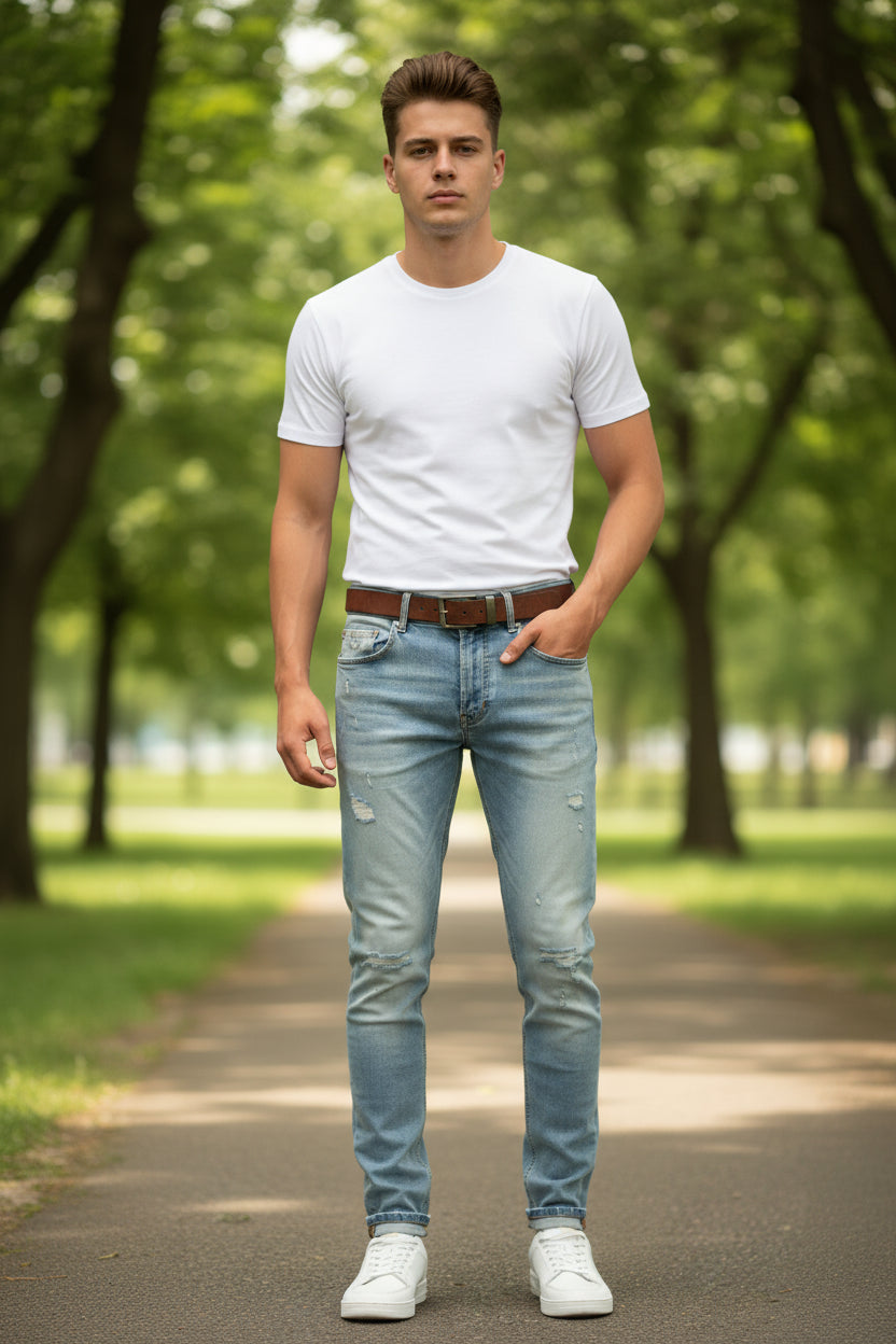 Light blue jeans with a brand label on a white background
