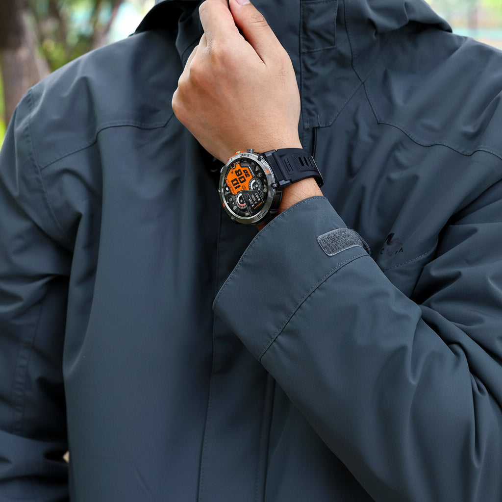 Person wearing a military smartwatch with additional watch displayed below, on a dark background.