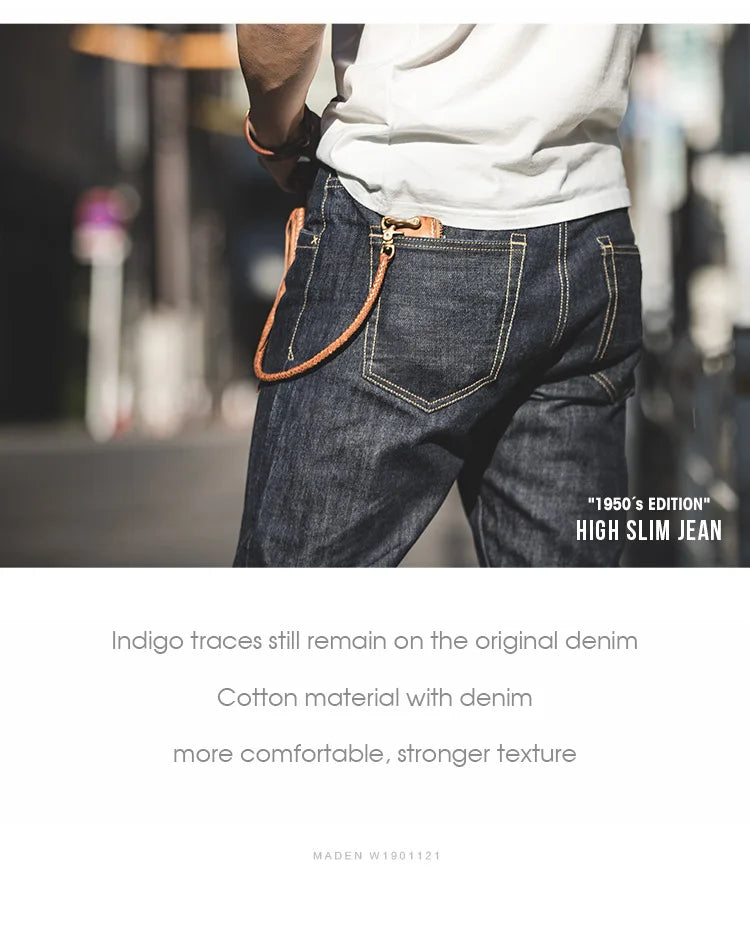 Person wearing high slim jeans with a blurred street background