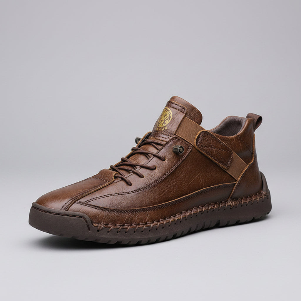 Brown leather shoe on a wooden block with a beige background