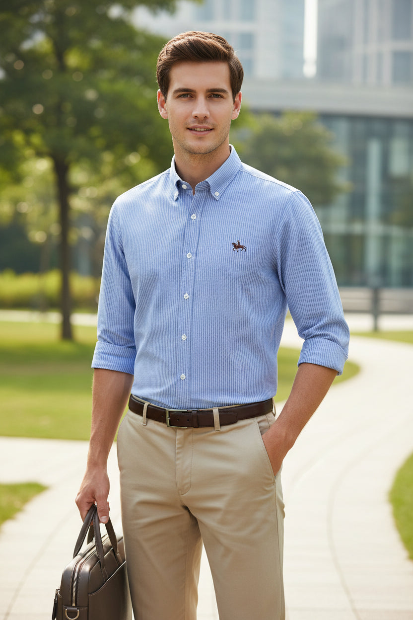 Folded blue checkered shirt with a logo on a white background