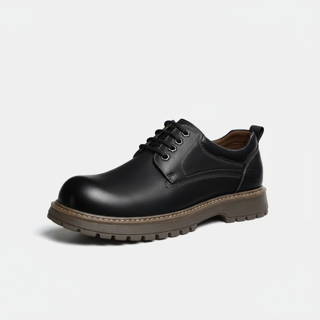 Black leather shoe on a white background
