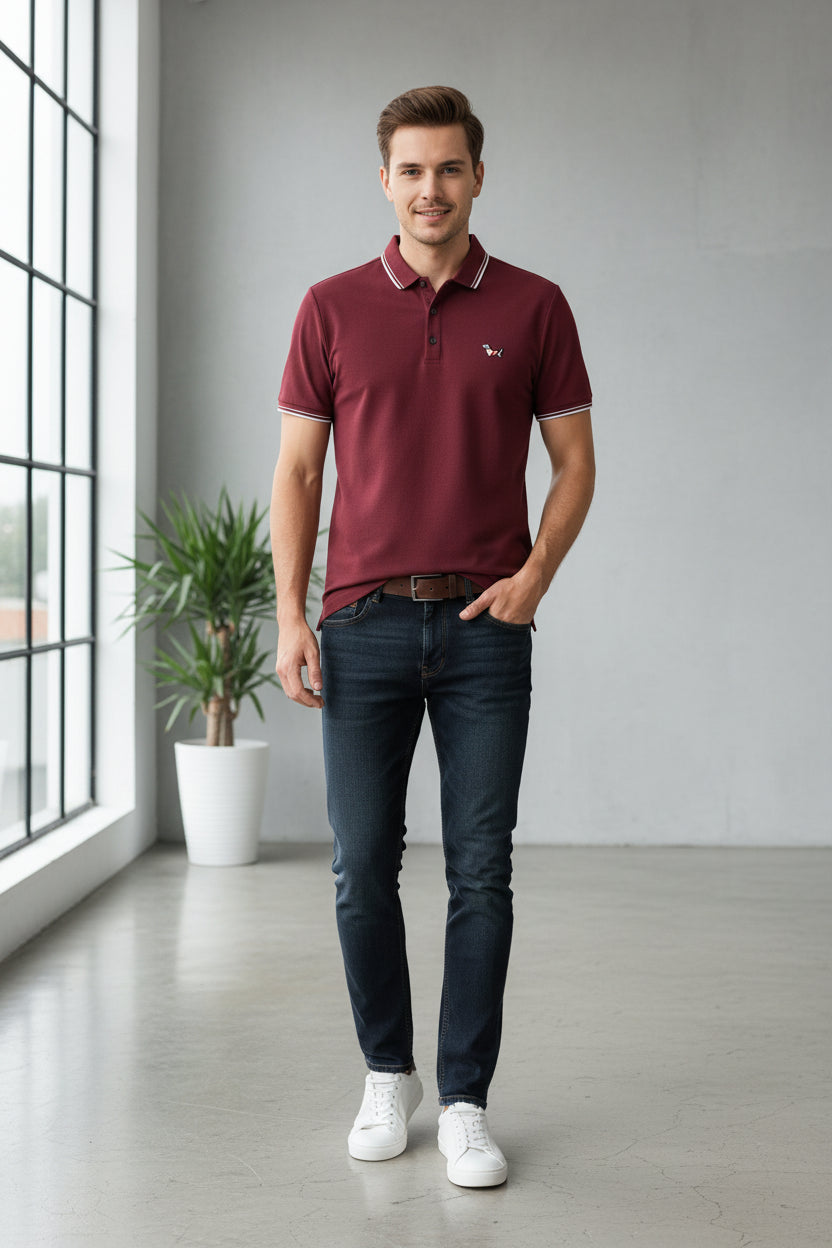 Maroon polo shirt with 'BOOS' logo on a rack of clothes
