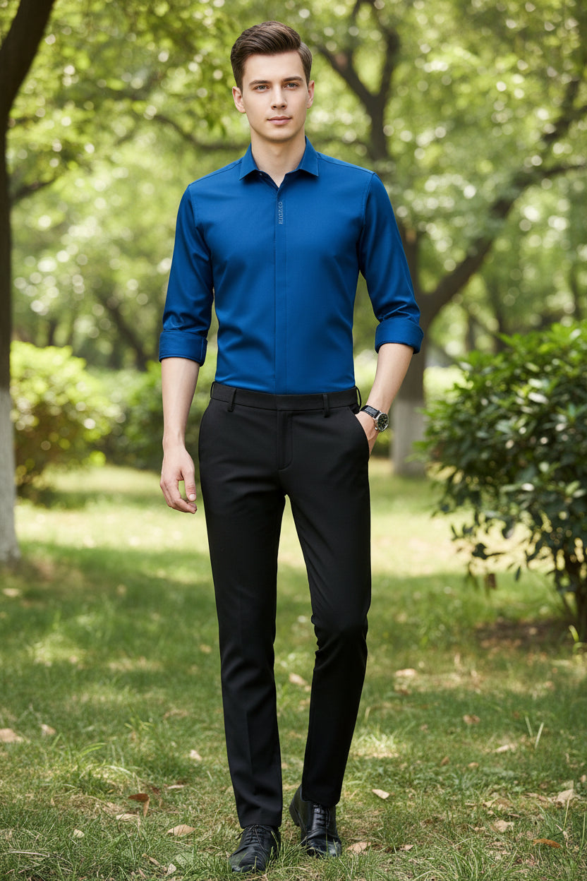 Blue dress shirt with rolled-up sleeves on a gray background