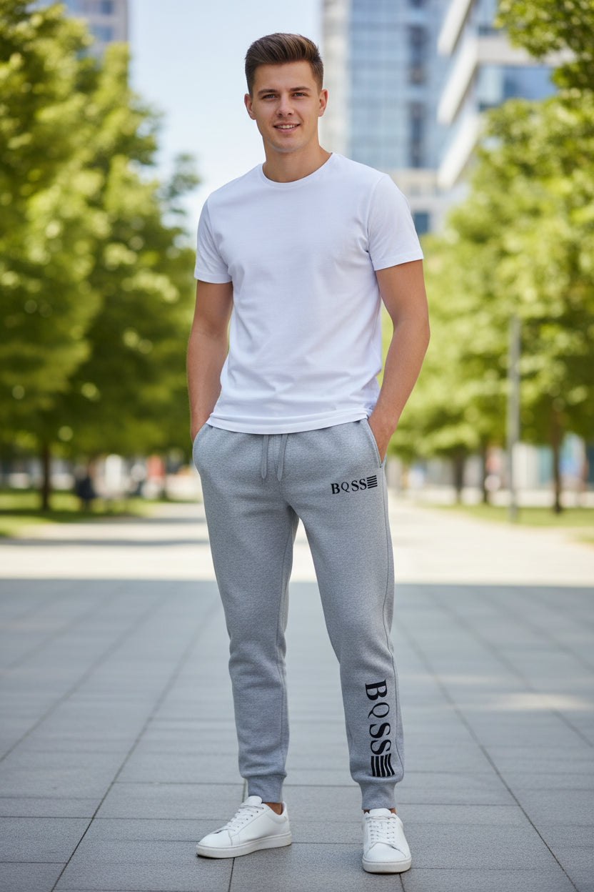 Gray sweatpants with 'BOSS' logo on a white background