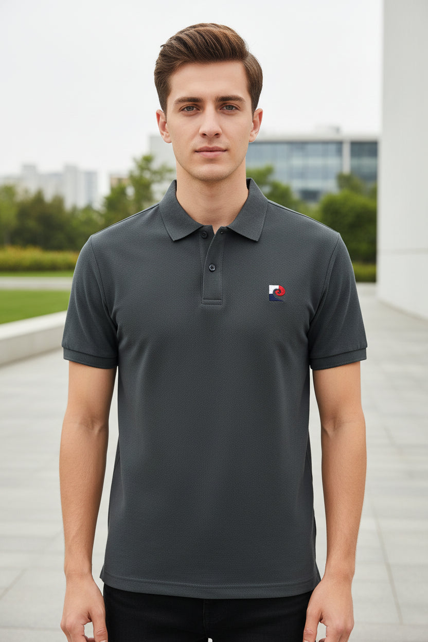 Gray polo shirt with brand logo on a hanger