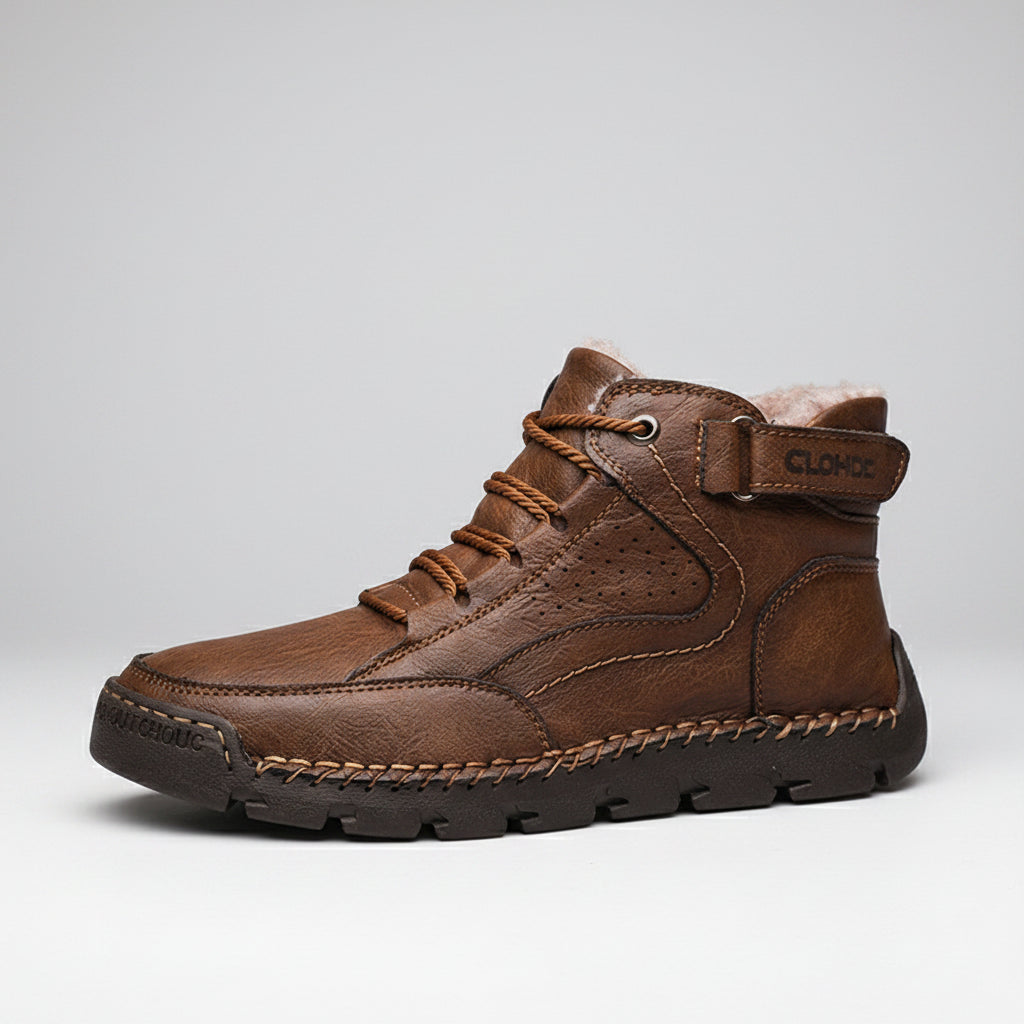 Brown leather boot with brown laces on a white background