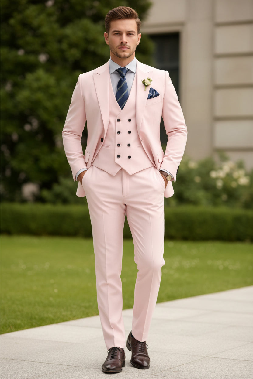 Pink suit with a striped tie and boutonniere on a white background