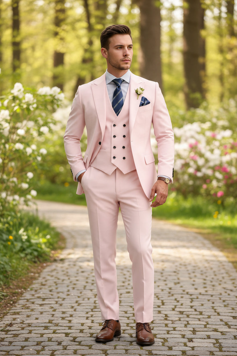 Pink suit with a striped tie and boutonniere on a white background