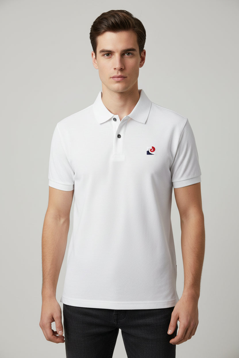 White polo shirt with brand logo on a hanger