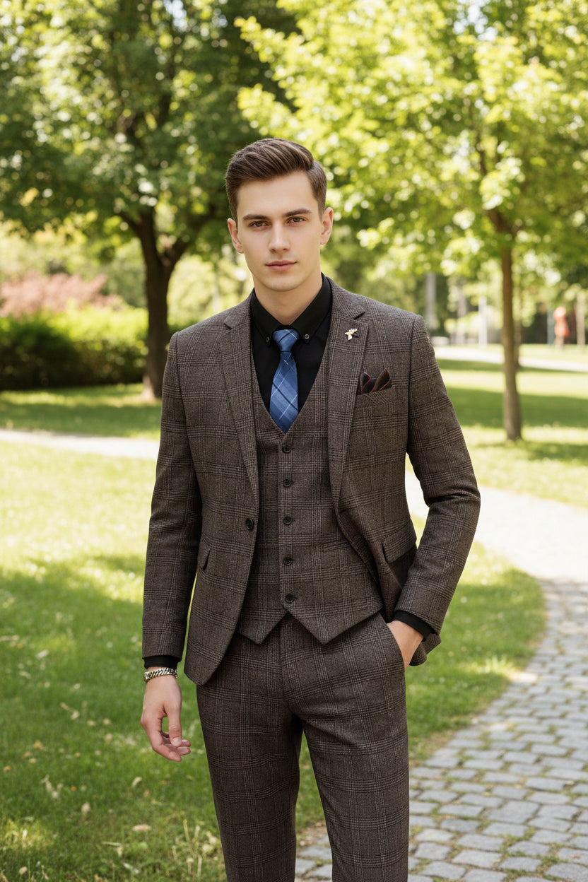 Person wearing a brown checkered suit in a kitchen setting
