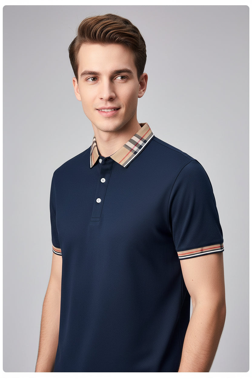 Navy blue polo shirt with checkered collar held by a hand