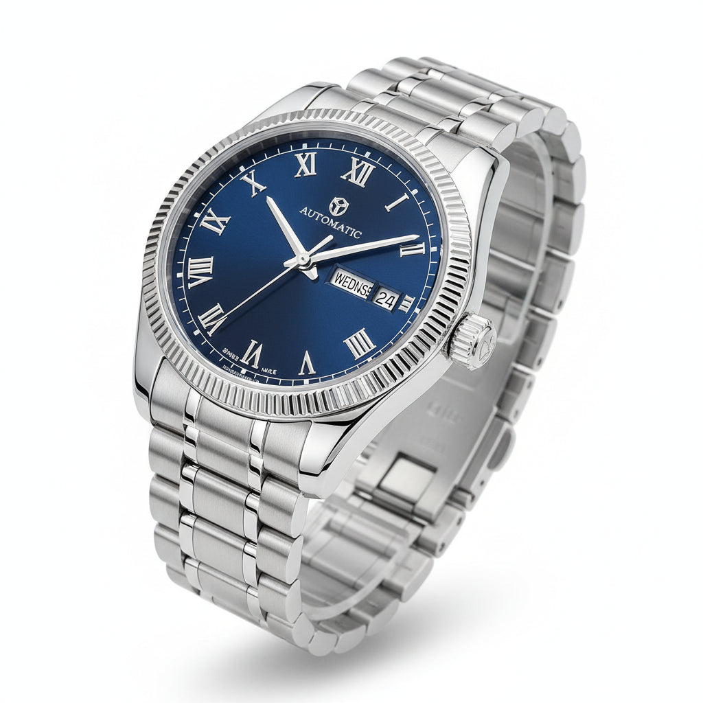 Silver watch with green Roman numerals on a white background, featuring 'Monday' brand.