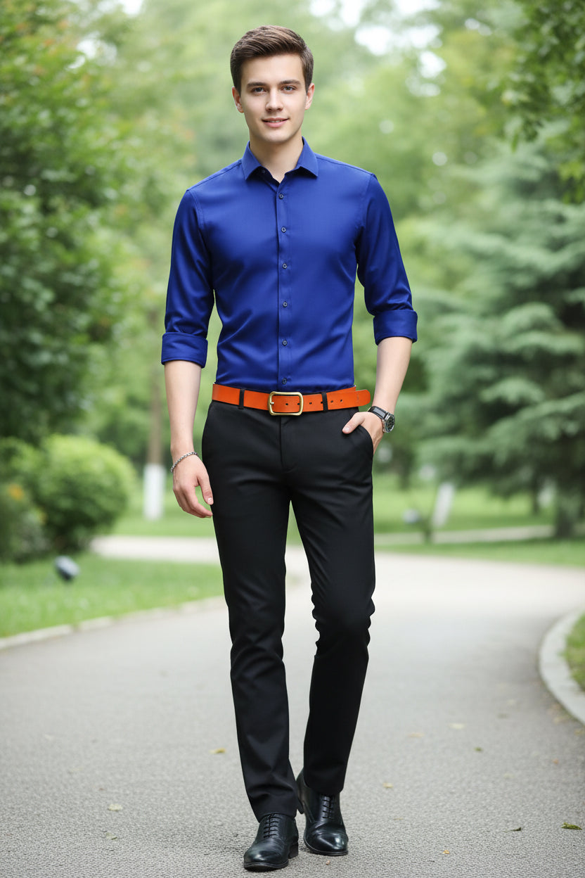 Blue dress shirt with rolled-up sleeves worn by a person on a white background