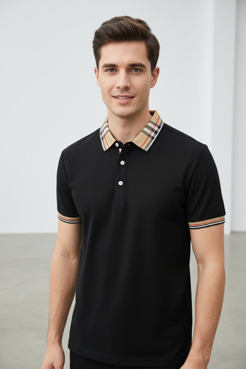 Black polo shirt with checkered collar on a hanger, brand label visible