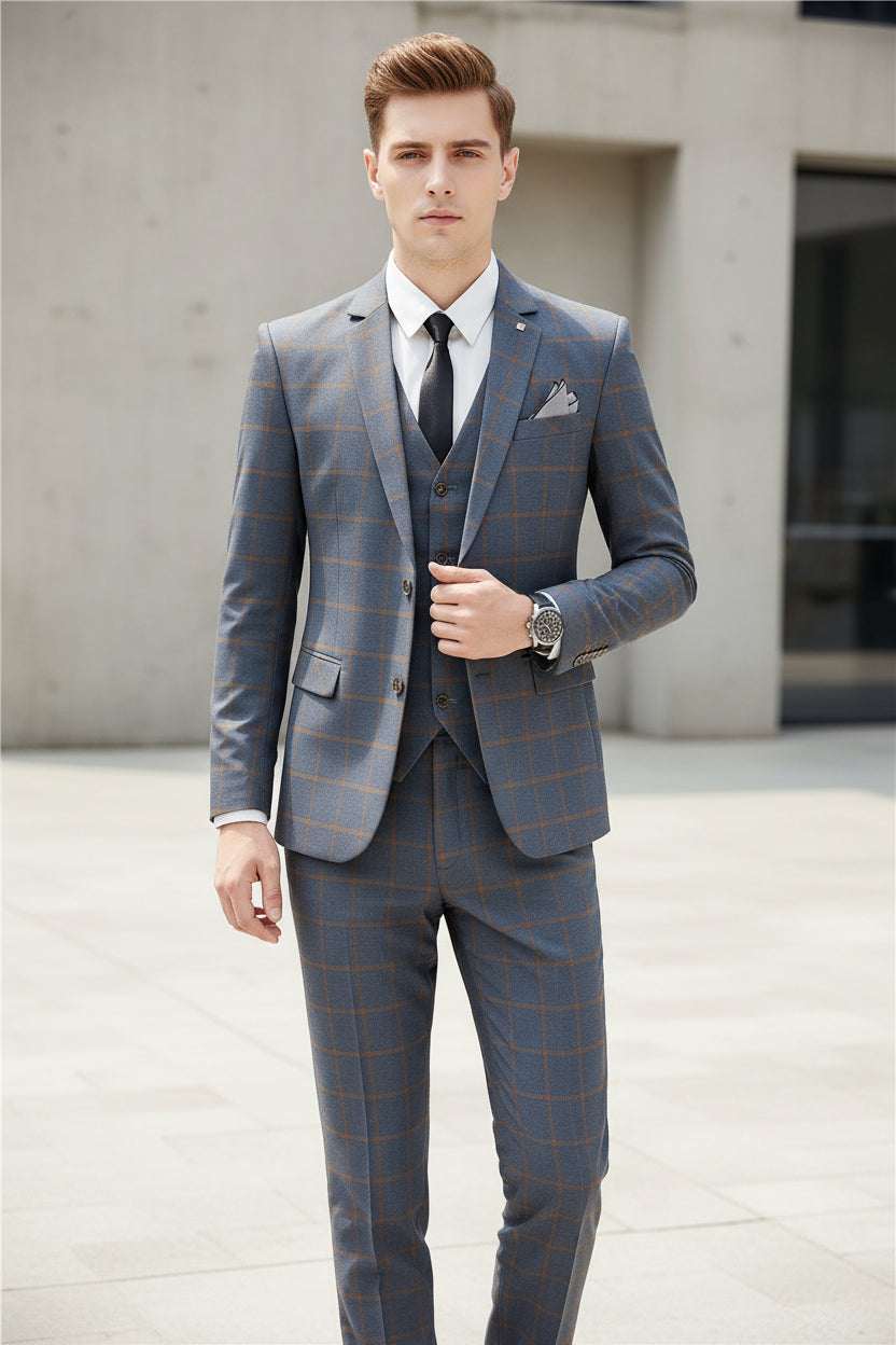 Person wearing a blue checkered suit standing in a cafe.