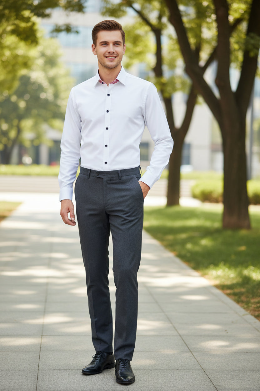 Folded white dress shirt with red and white checkered interior on a gray background