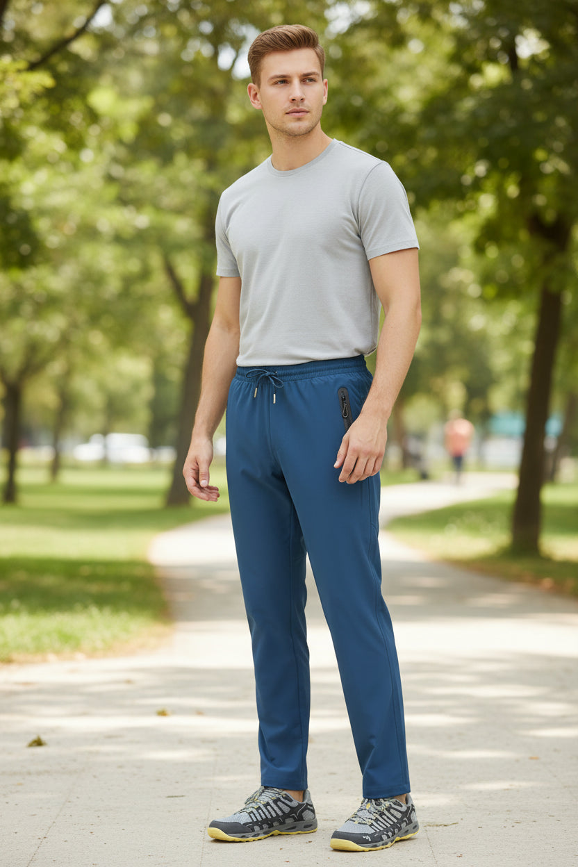 Blue pants with a zipper pocket on a white background