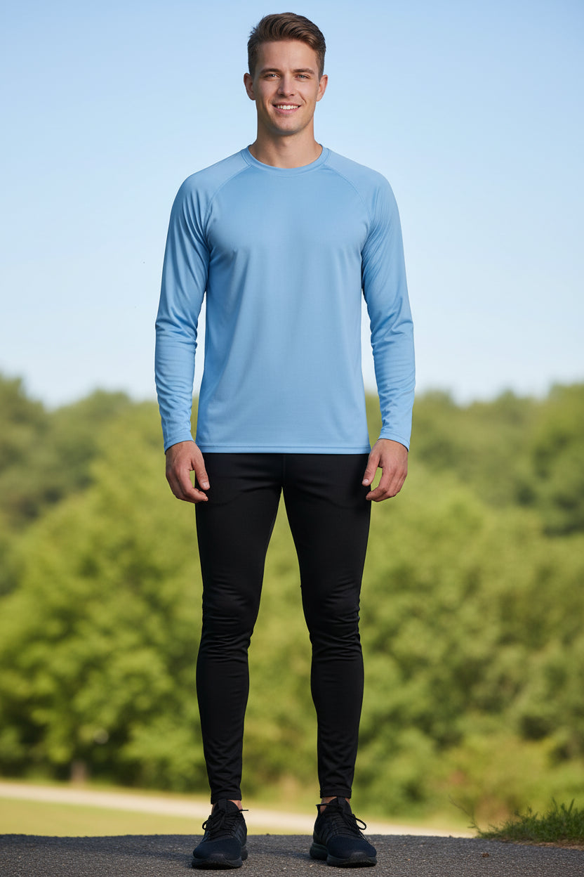 Man wearing a light blue long-sleeve shirt with TacVasen branding on a white background.