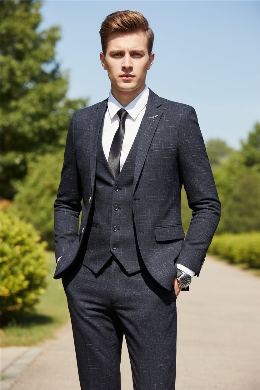 Person wearing a gray checkered suit in a coffee shop setting