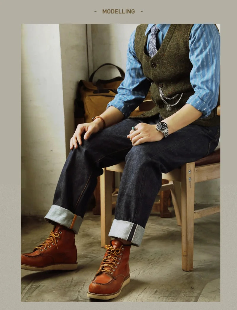 Person wearing brown leather boots, a blue shirt, and dark pants sitting on a wooden chair.