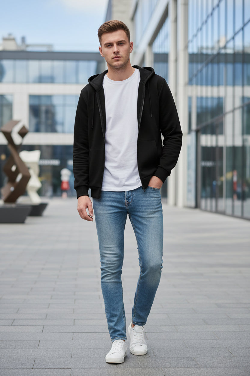 Black hoodie with a zipper on a light gray background