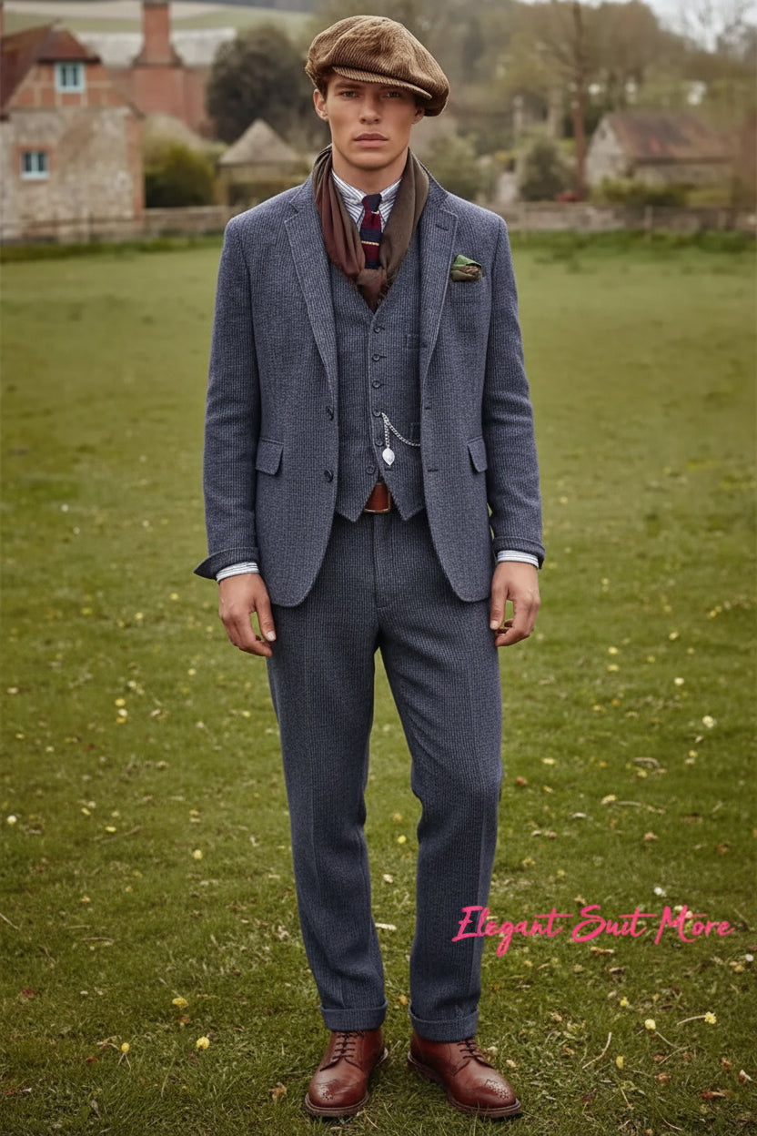 Man in a suit and cap standing in a field with a rustic background