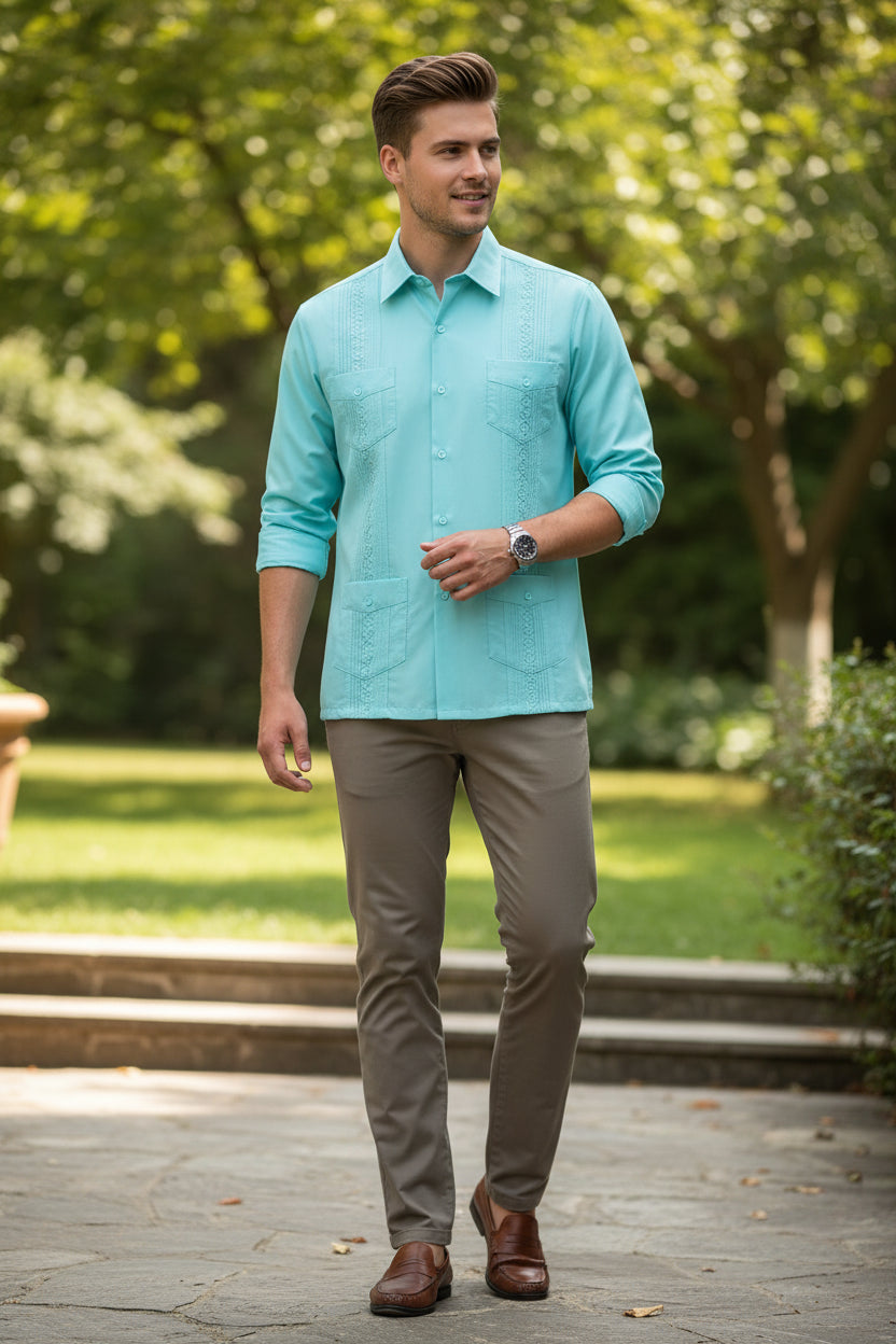 Light blue shirt with decorative patterns  Youg man wearing it outside