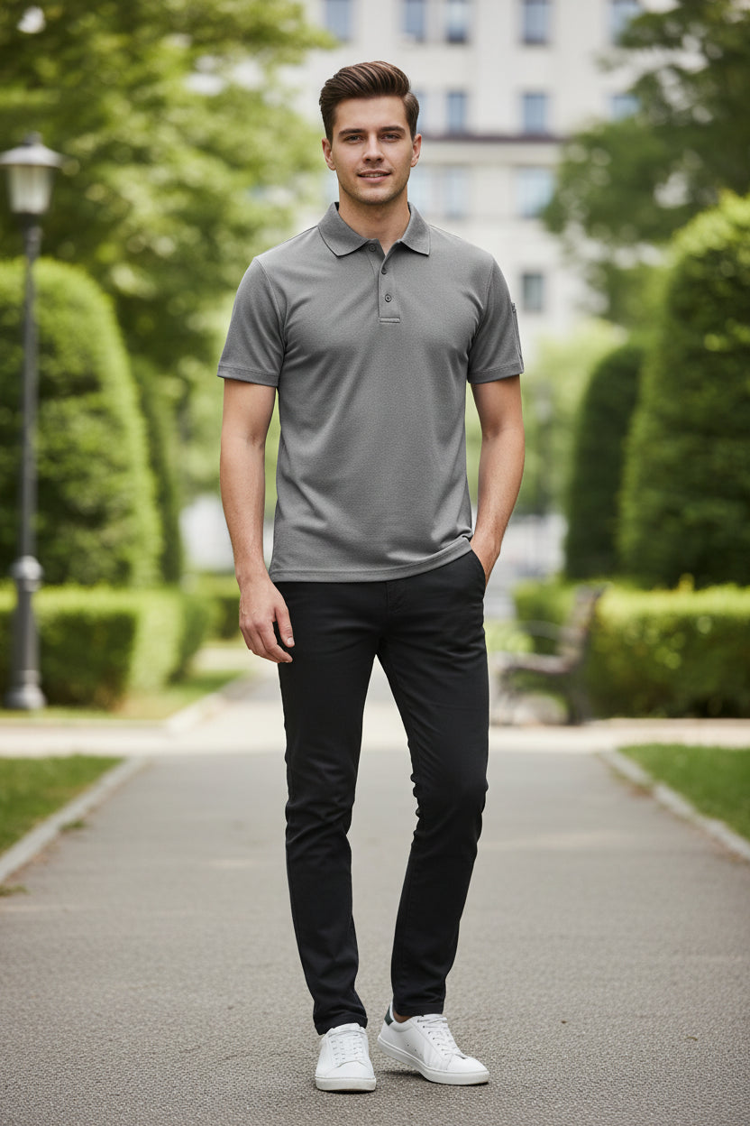 Gray polo shirt on a white background