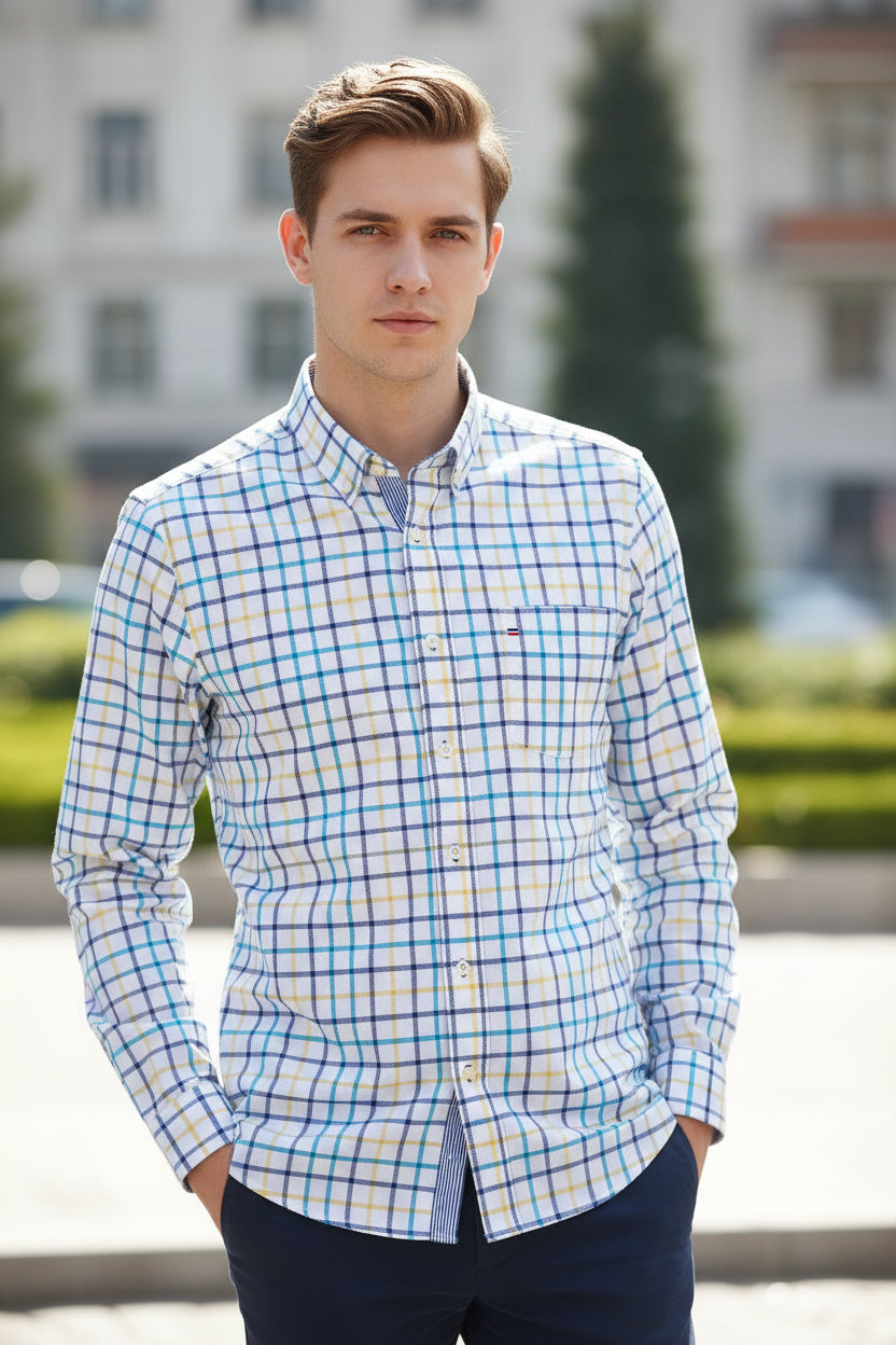 Folded checkered shirt with brand logo on a white background