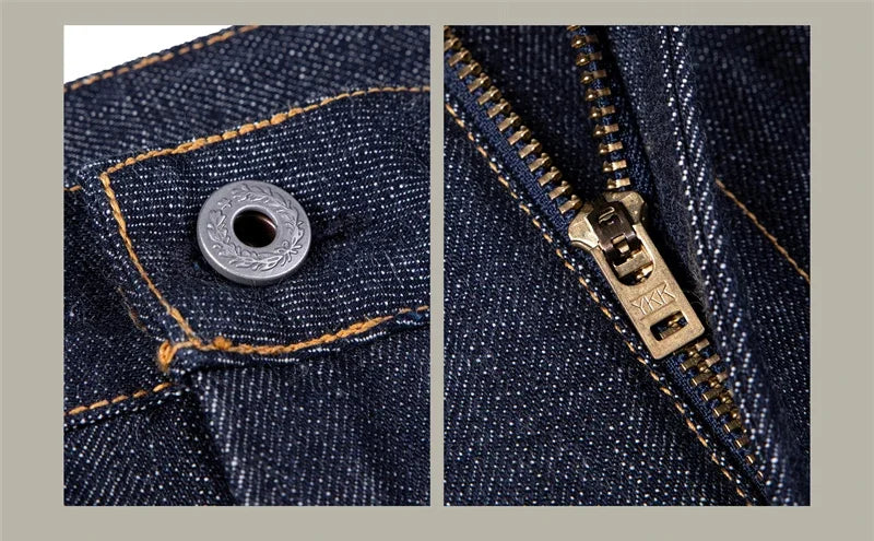 Close-up of a button and zipper on denim fabric.
