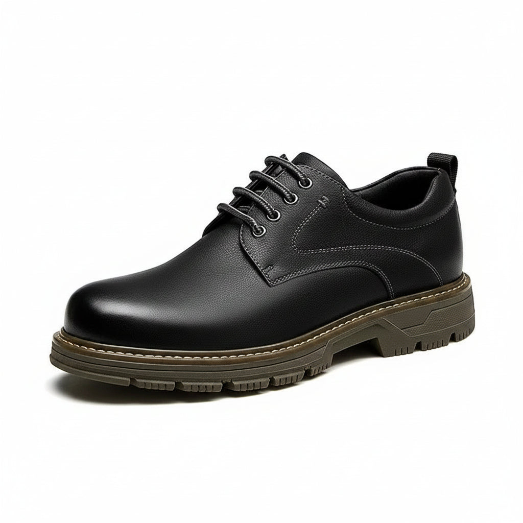Black leather shoe on a white background