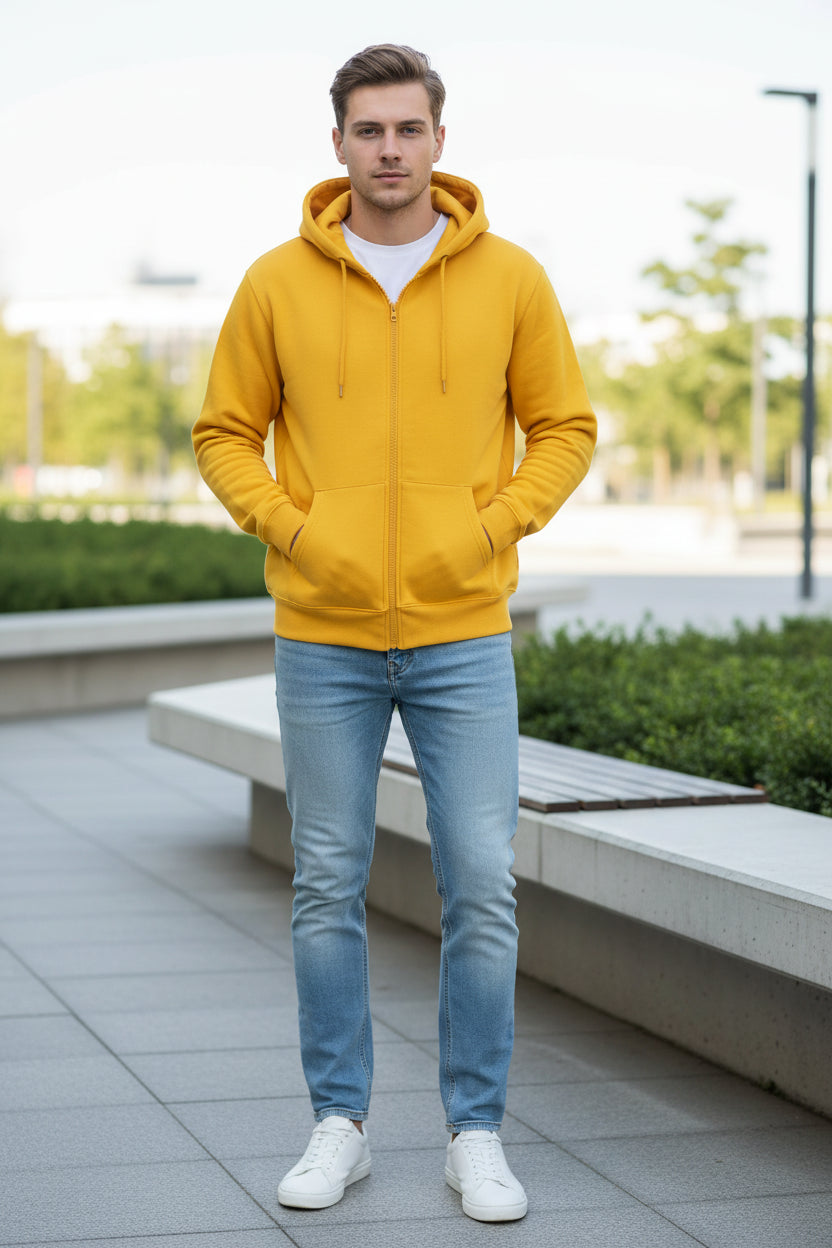Yellow hoodie with a zipper on a white background