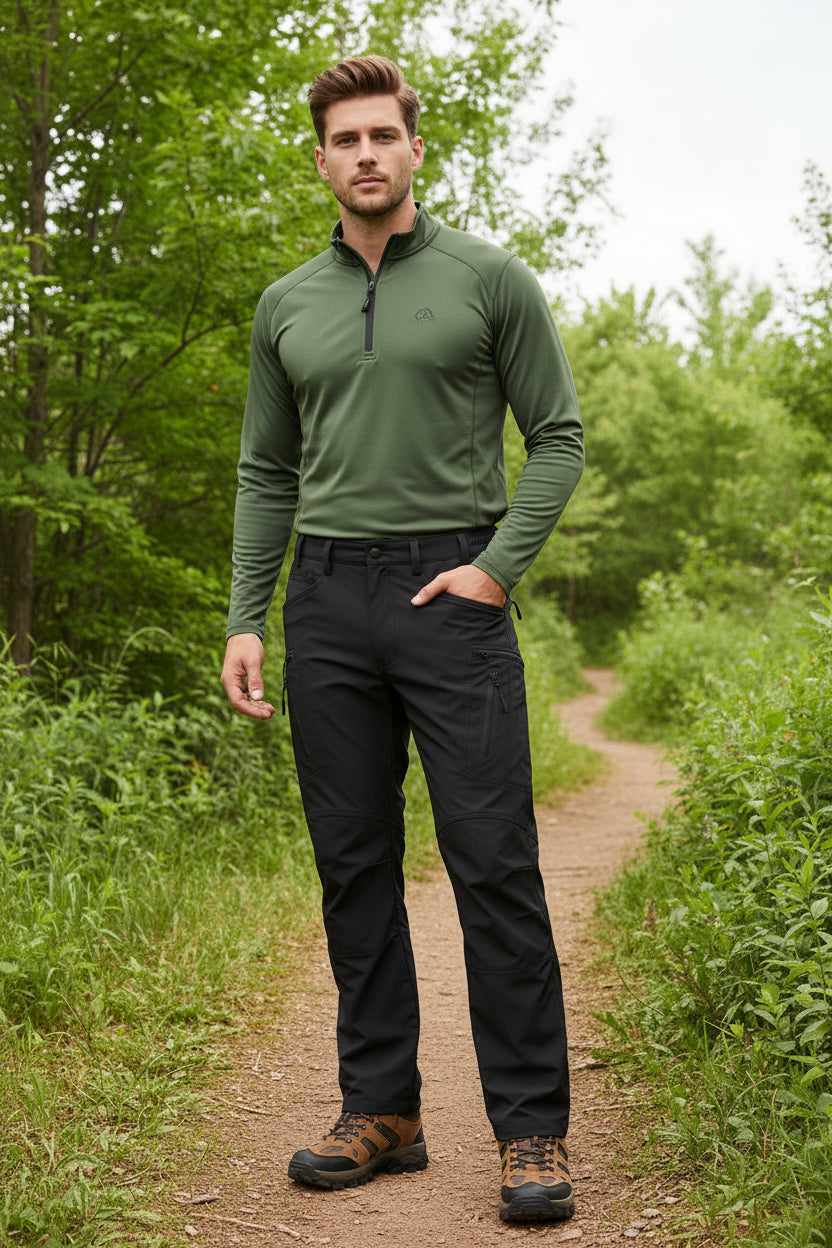Black pants worn by a person on a white background