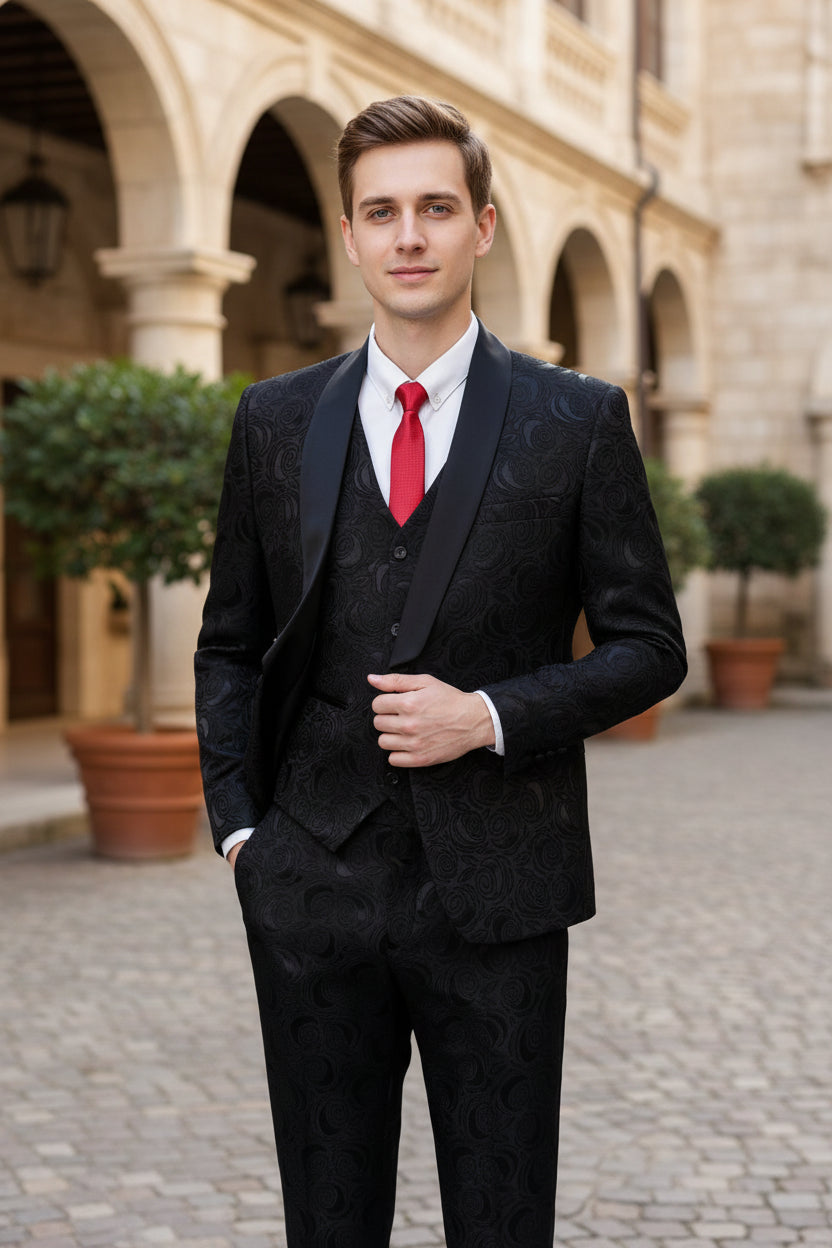 Black patterned suit with a red tie on a white background